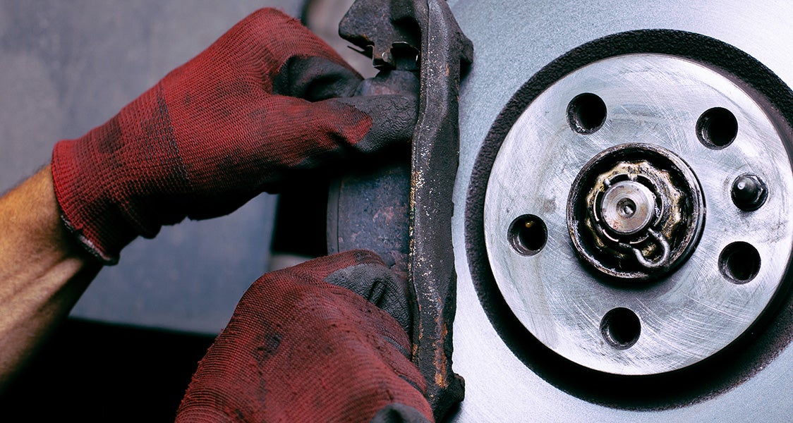 a person working on brakes